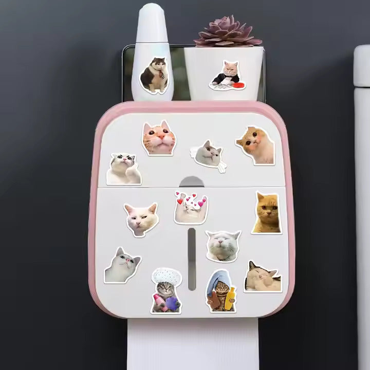 Silly cat sticker collection displayed on a decorative organizer with various cute cat images